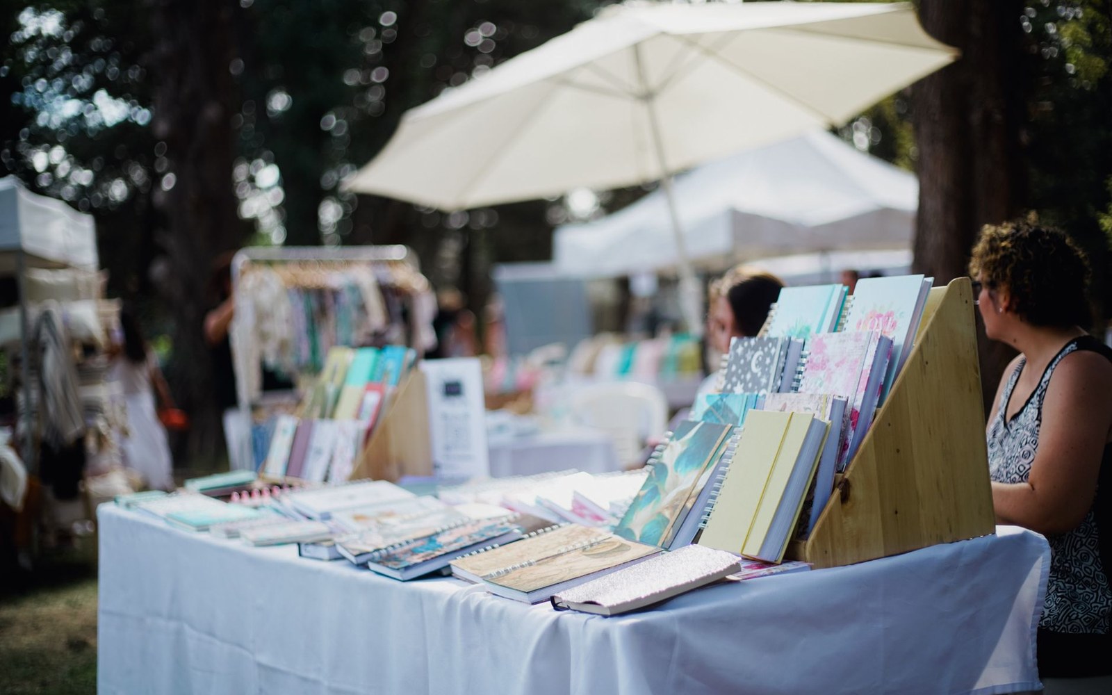 a zine fair table spread with pamphlets